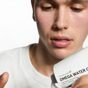 Model with Omega Water Cream on his finger
