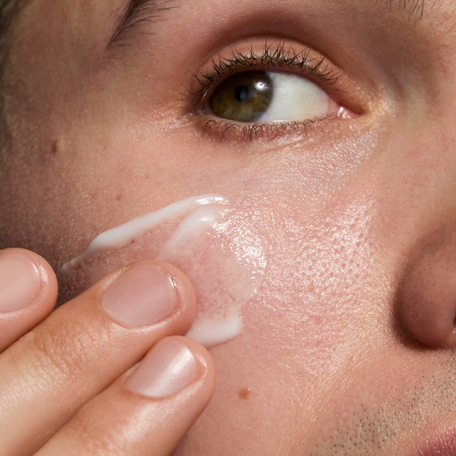 Model applying Omega Water Cream