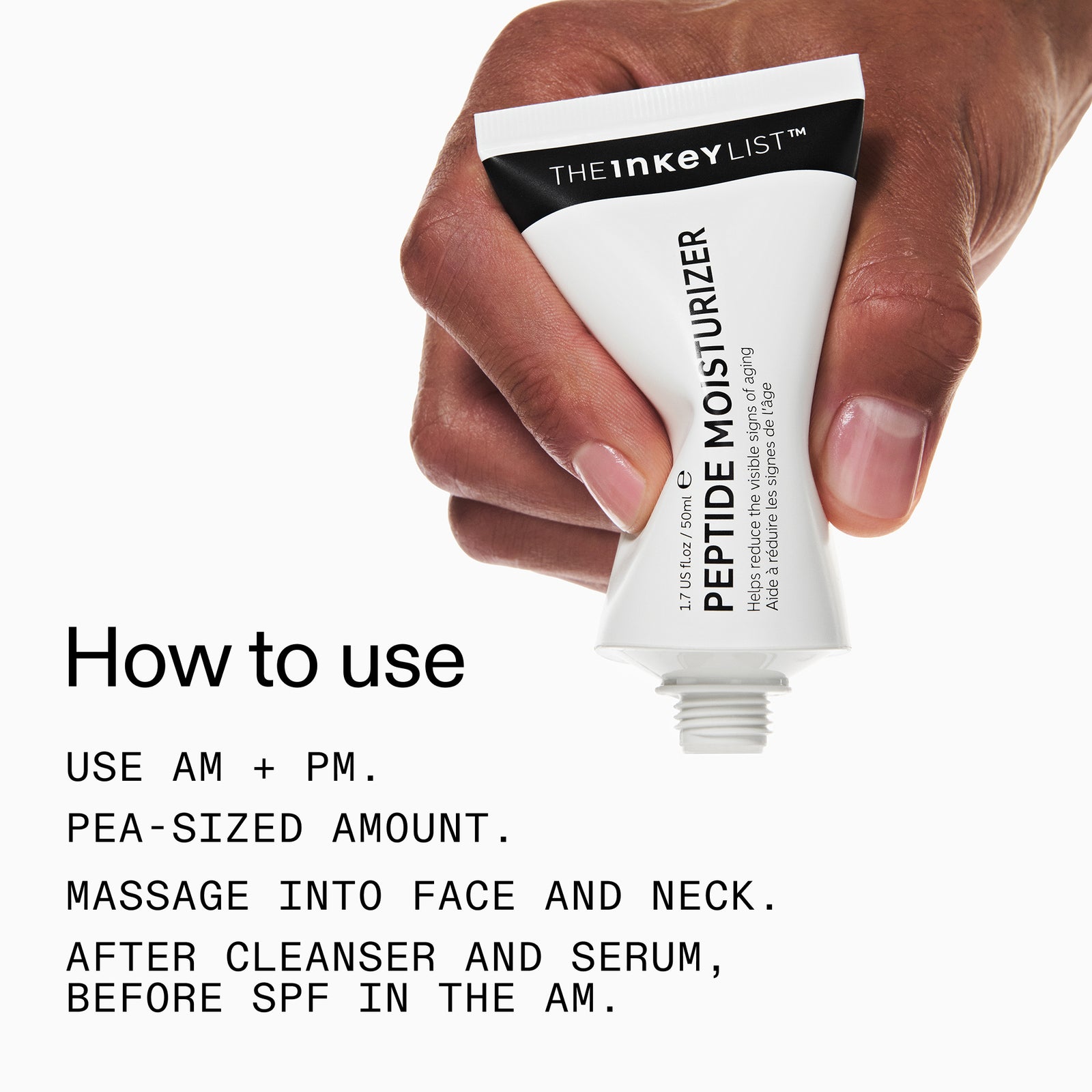 Hand holding a tube of The Inkey List Peptide Moisturizer with usage instructions.