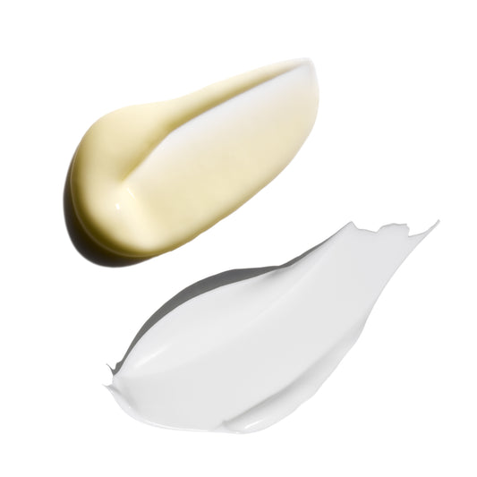 Two swatches of cream, one gold and one white, on a white background