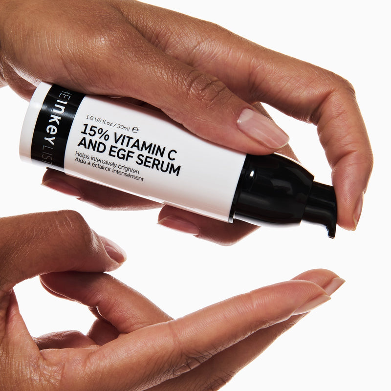 Vitamin C serum onto fingers