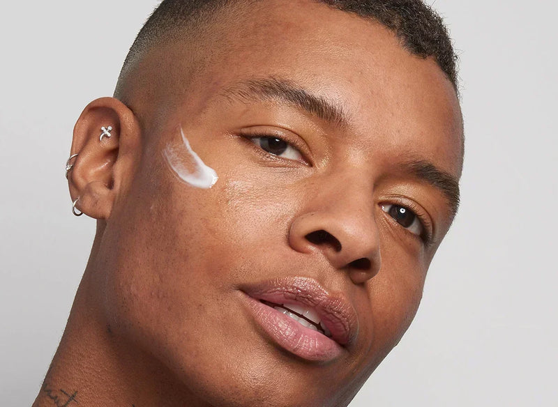 man with cream on his face