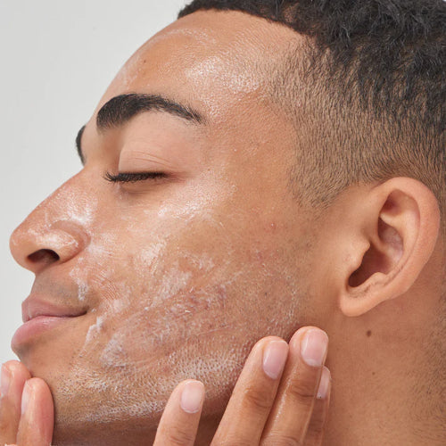 man with cream on his face