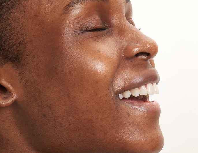 woman smiling to the right