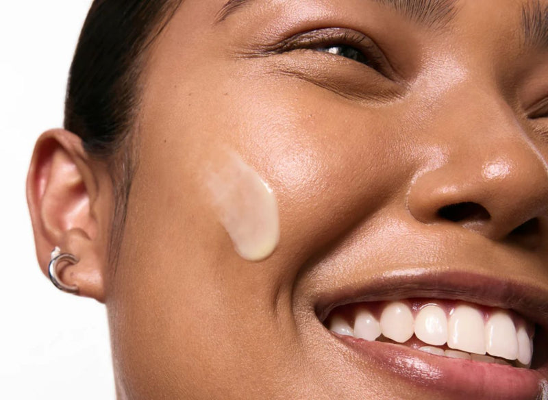 Women with retinol on her face