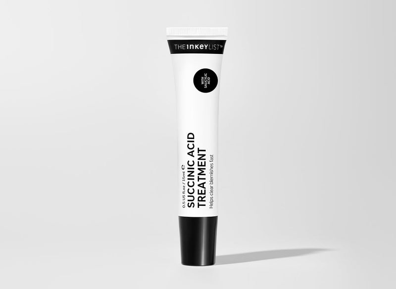 Bottle of Succinic Acid on white background