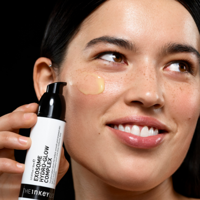 woman holding exosome serum