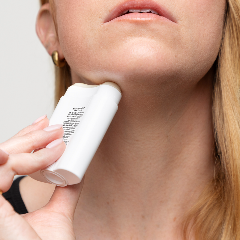 woman using neck stick