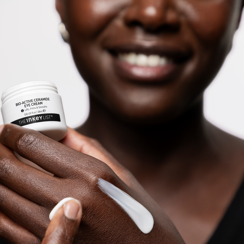 woman applying cream to her hand