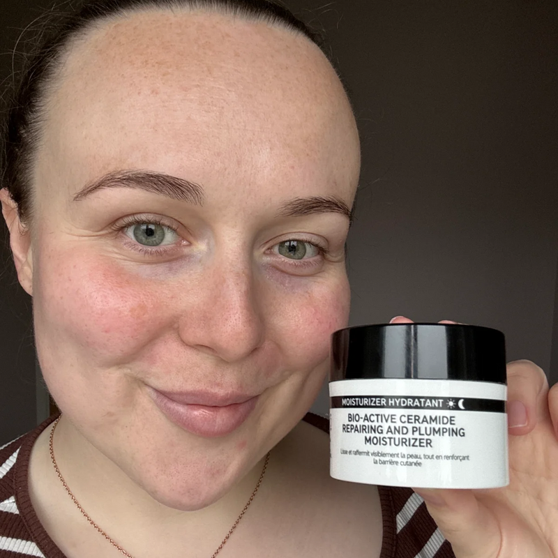 woman holding bio active moisturiser