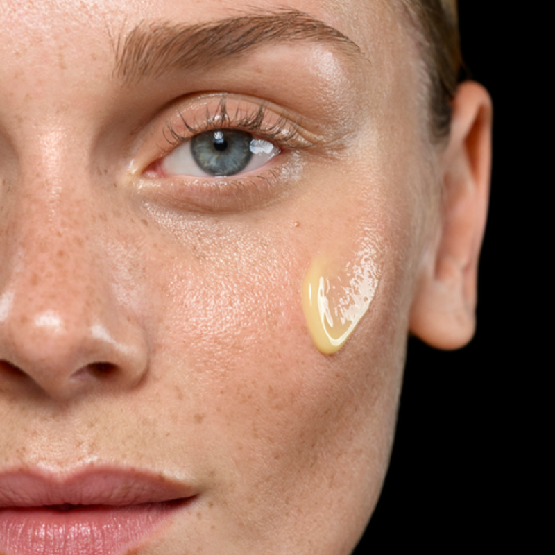 woman with serum on her face