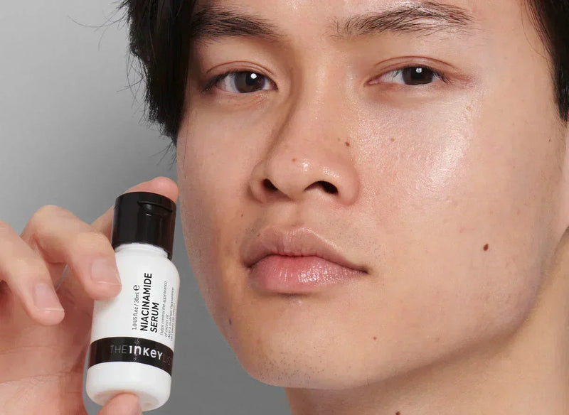 Man with serum bottle