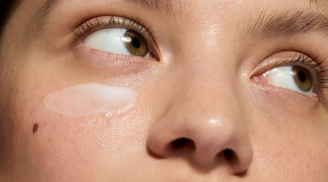 Model applying skincare