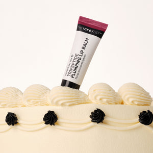 Tripeptide Plumping Berry Lip Balm in birthday cake