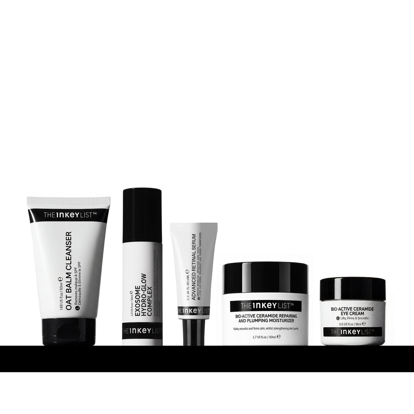Five skincare products from The Inkeyist brand arranged in a row on a black surface against a white background. 