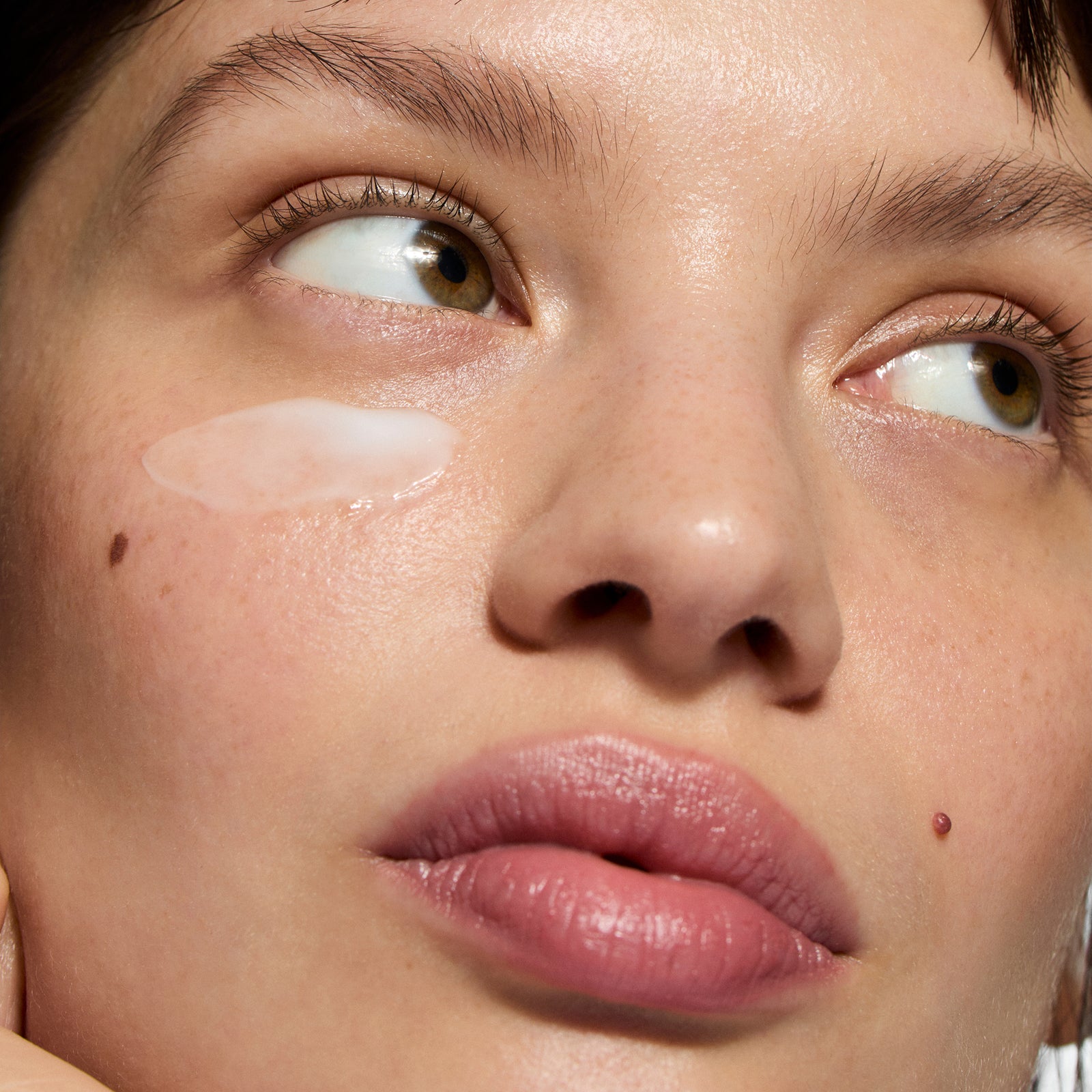 Model with Caffeine Eye Cream on her face