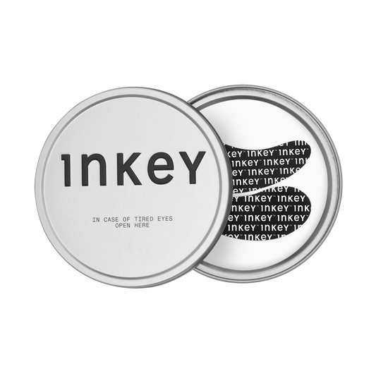 Two silver tins with 'Inkey' branding on a white background