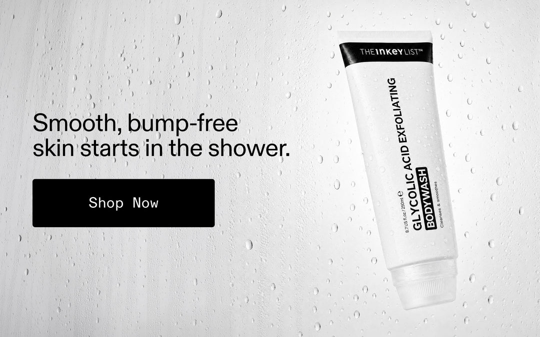 A white tube of glycolic acid exfoliating body wash by The Inkey List is shown on a light gray water-droplet background with the text 'Smooth, bump-free skin starts in the shower.' and a black 'Shop Now' button.