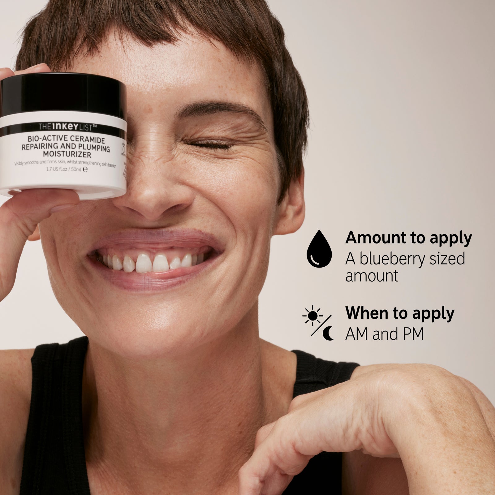 Model holding Bio-Active Ceramide Repairing and Plumping Moisturiser with how to use instructions.