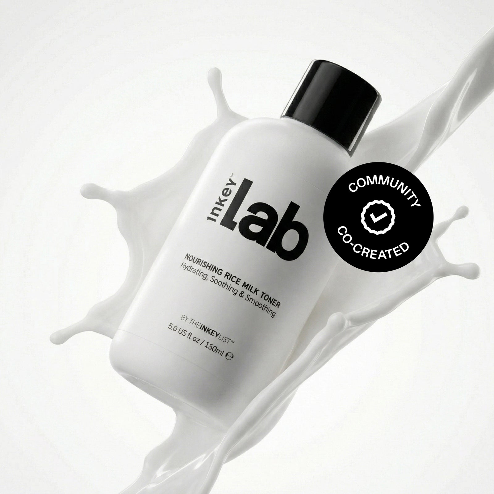 Inkey Lab skincare product with a splash of white liquid on a light gray background