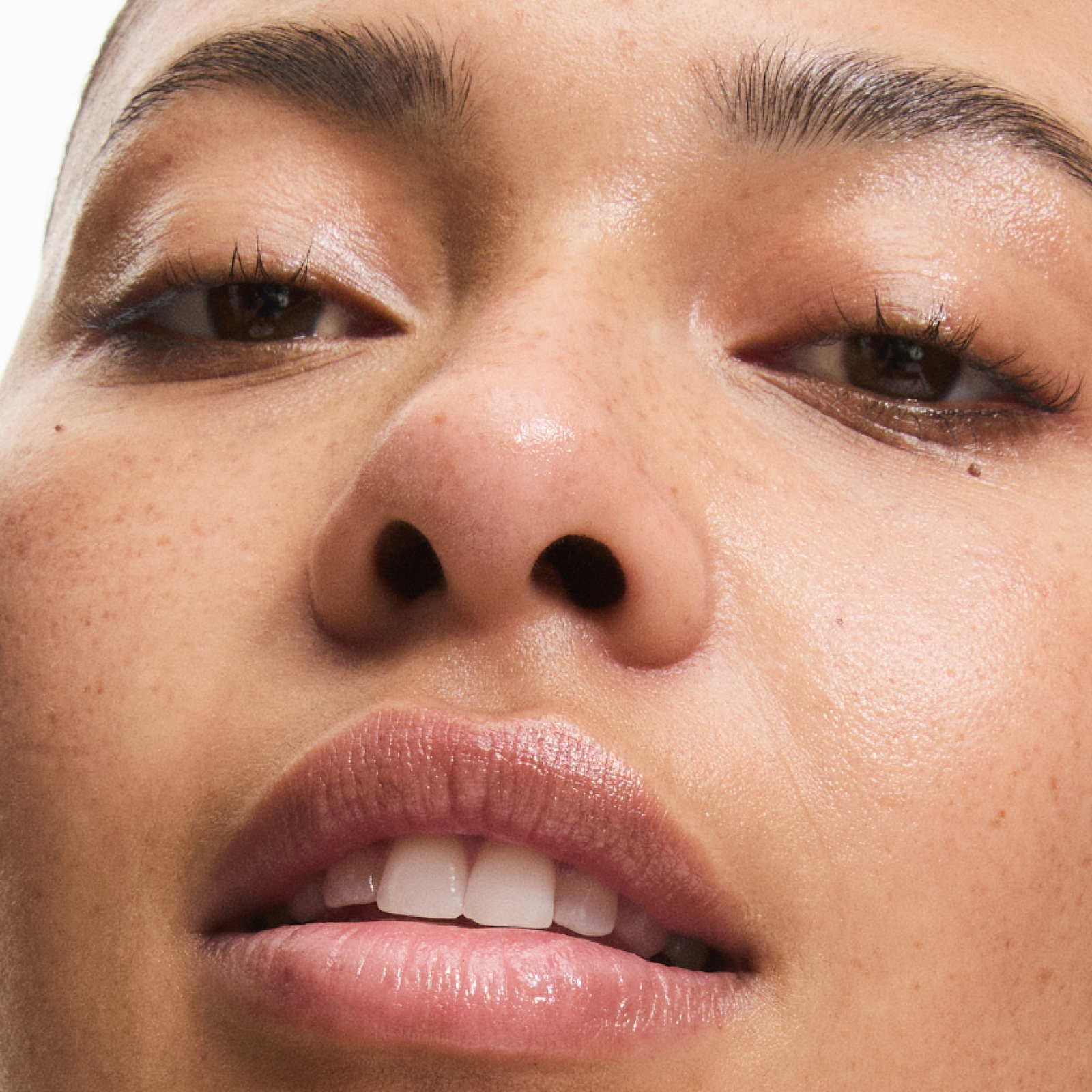 Model with Ectoin Hydro-barrier serum on her face