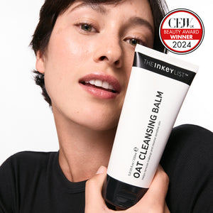 Model with Oat Cleansing Balm and CEW Award in the corner