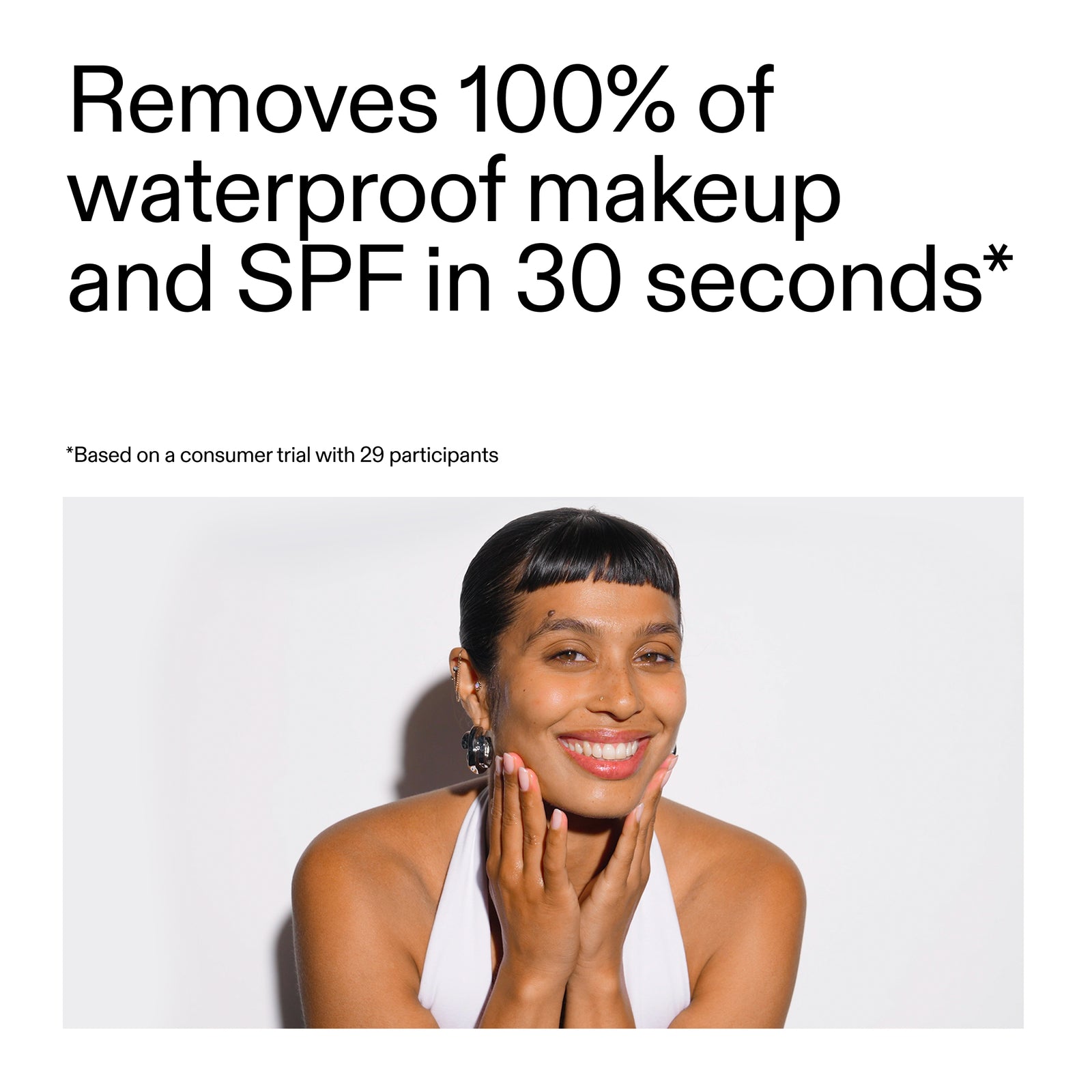 WOman looking into the camera with key claim on how Oat removes make up