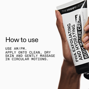 Hand holding PHA body cream with application instructions on a white background