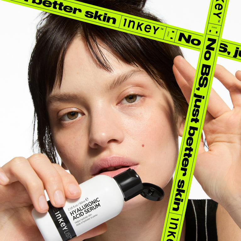 Person holding a Inkey skincare product with No BS Just better skin branding