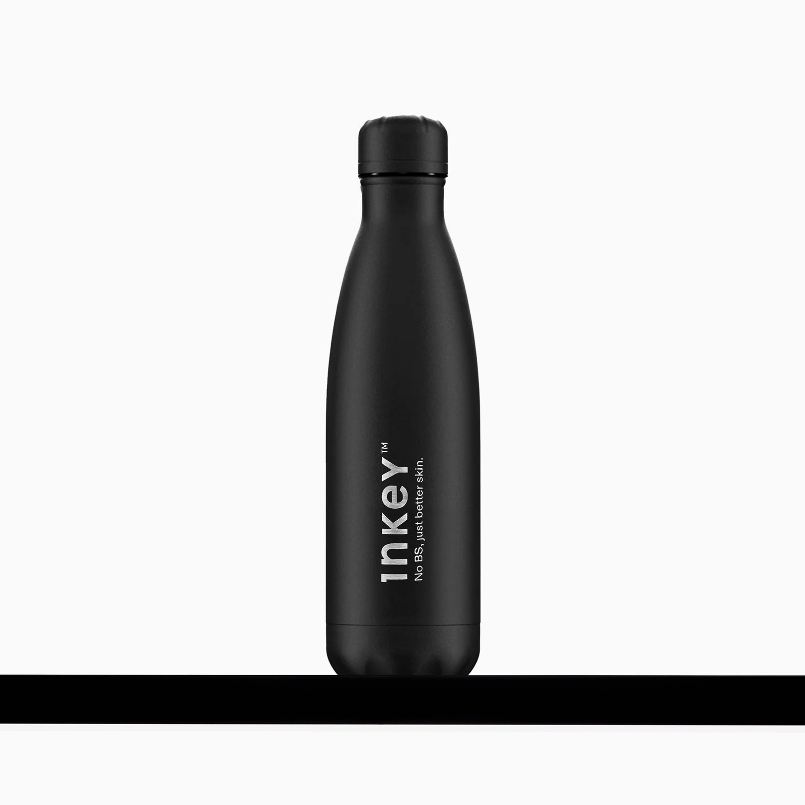 INKEY black chilly bottle on a shelf