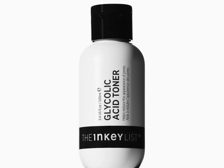 A white bottle of Glycolic Acid Toner by The Inkey List, featuring a black cap and a black band at the bottom with the brand name, set against a plain white background.