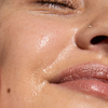 close up of a womans shiny cheeck