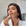Woman applying skincare