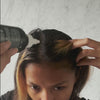 woma applying scalp treatment