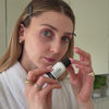 women applying ha serum
