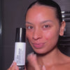 woman applying acne serum