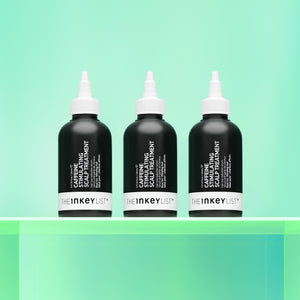Light shot of The Hair Growth Booster Bundle against a green background