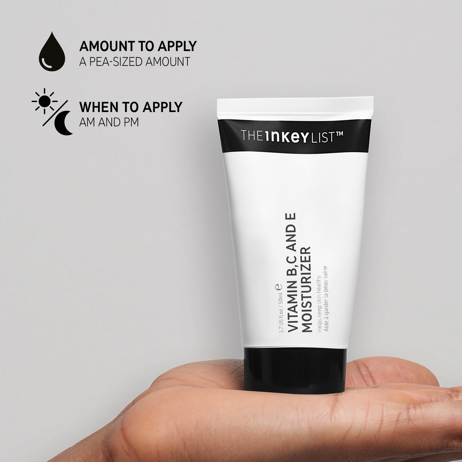 Hand holding Vitamin B, C and E Moisturizer with when to apply